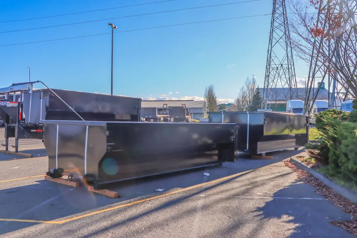 Roll-off dumpster ready for waste disposal at job site for Demolition Dumpster Rental in Marilla